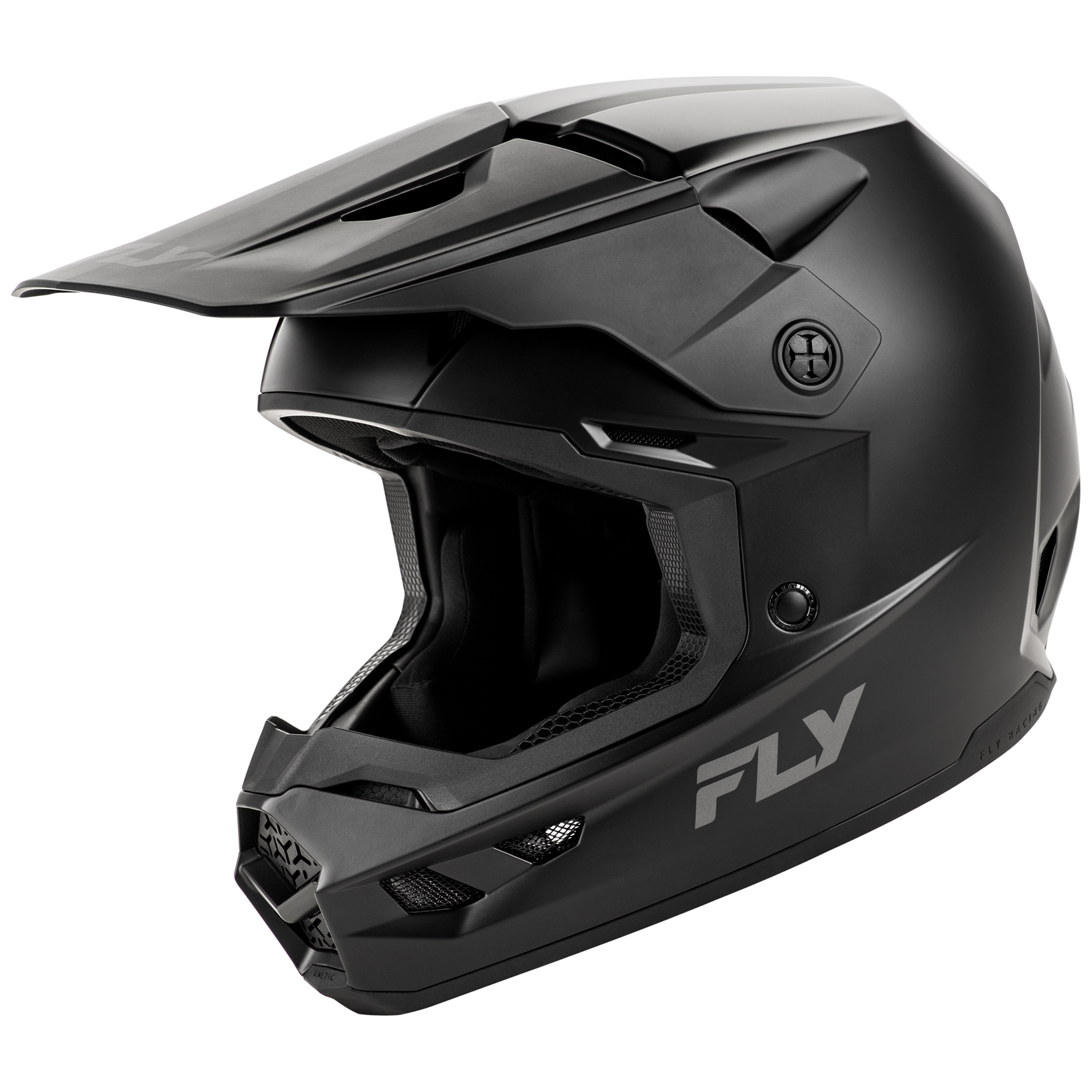 Front three-quarter view of the matte black FLY Racing Kinetic Solid Youth Helmet, showcasing the aggressive True Functional Ventilation intake ports, sleek solid contour lines, and integrated roost nose guard.