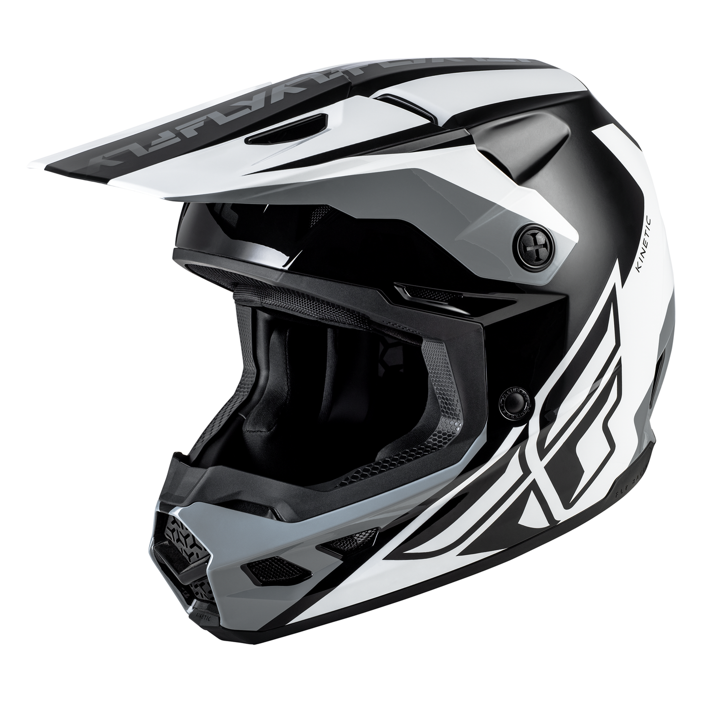 Front three-quarter view of the FLY Racing Kinetic Crest Helmet in black displaying the sharp geometric graphic scheme, integrated roost guard, and high-flow front mouthpiece assembly.