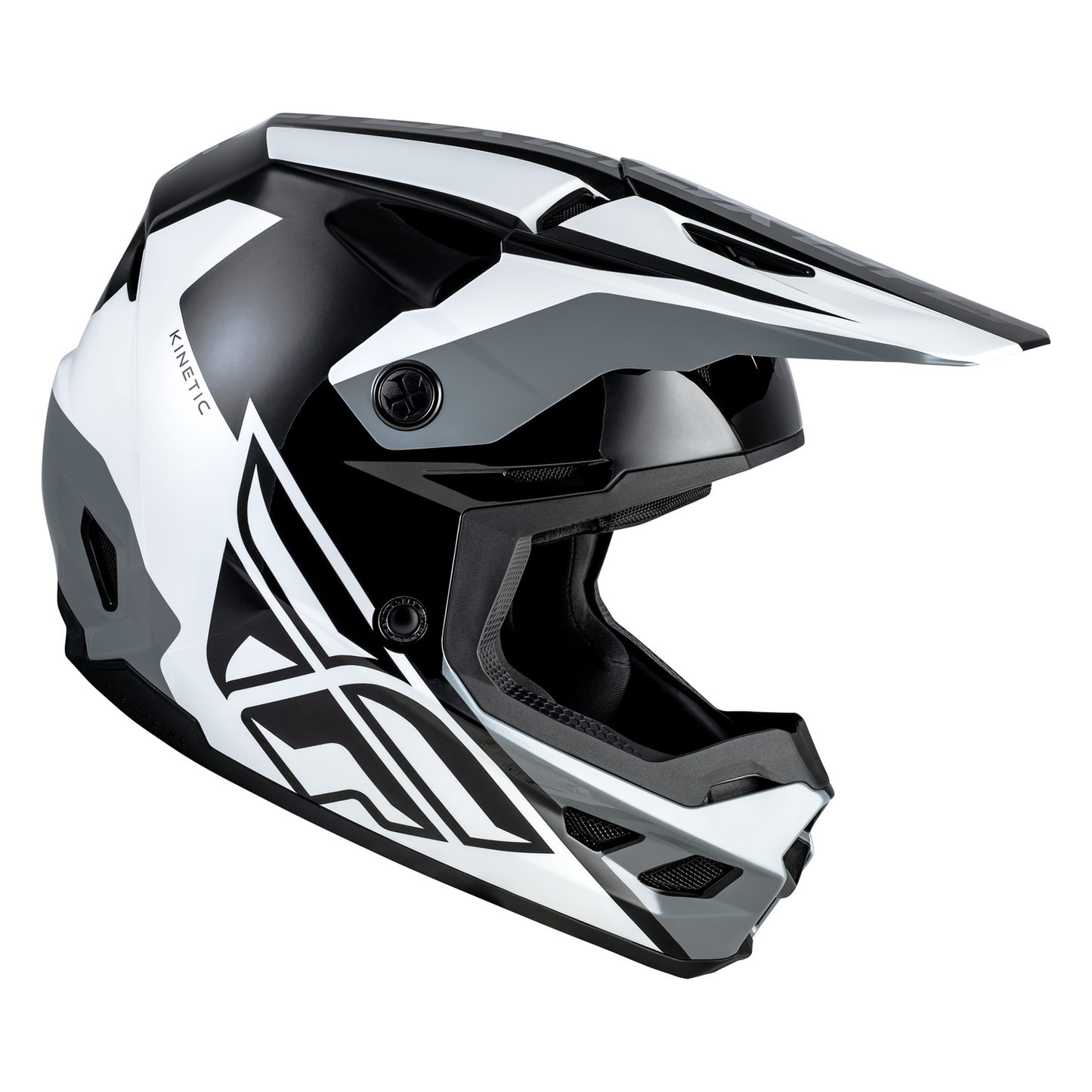 Side view of the FLY Racing Kinetic Crest Helmet in black displaying the sharp geometric graphic scheme, integrated roost guard, and aperture