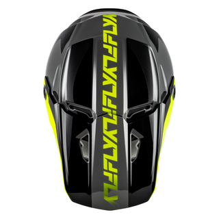 Top view of the FLY Racing Kinetic Crest Helmet in yellow displaying the sharp geometric graphic scheme, integrated roost guard.