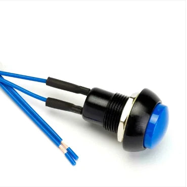 A blue push-button switch with a black and silver housing and two blue wires, shown on a white background. Cartek Battery Isolator external button in blue
