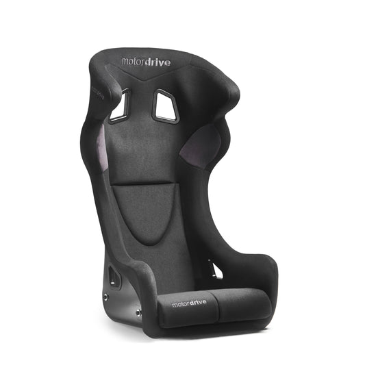 Motordrive The Club Race composite bucket seat showing the aggressive fixed-back shell profile, deep side hip support bolsters, large harness slots, clean black anti-slip fabric cover, and white Motordrive branding on a clean background Front