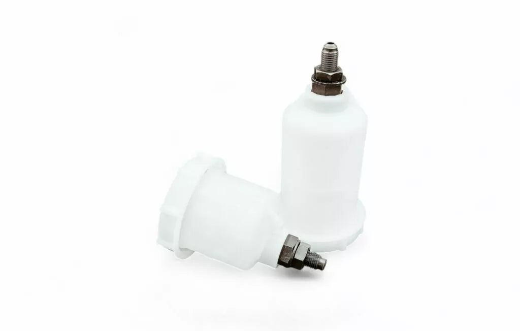 OBP Motorsport white translucent remote brake fluid reservoir with black screw-on cap and a 7/16 inch bottom male threaded mounting stud showing short and long options