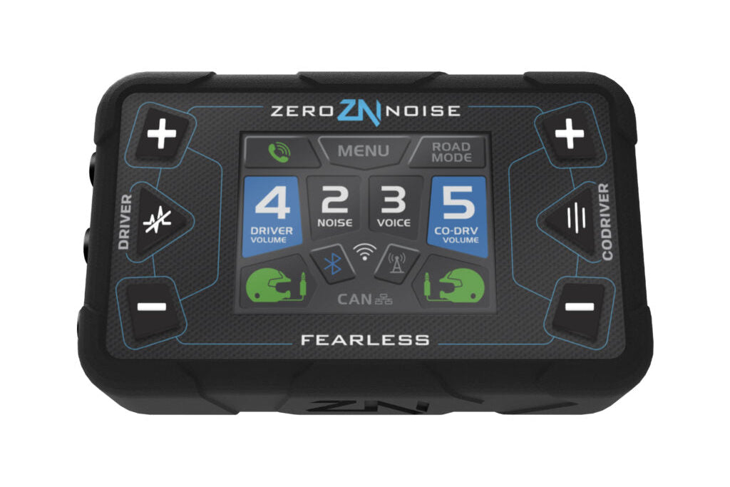 Front straight-on view of the re-engineered ZeroNoise Fearless ClearVoice digital amplifier featuring the upgraded 36 percent larger multi-colour graphic interface screen, black silicone housing, and panel-mounted connection cables.